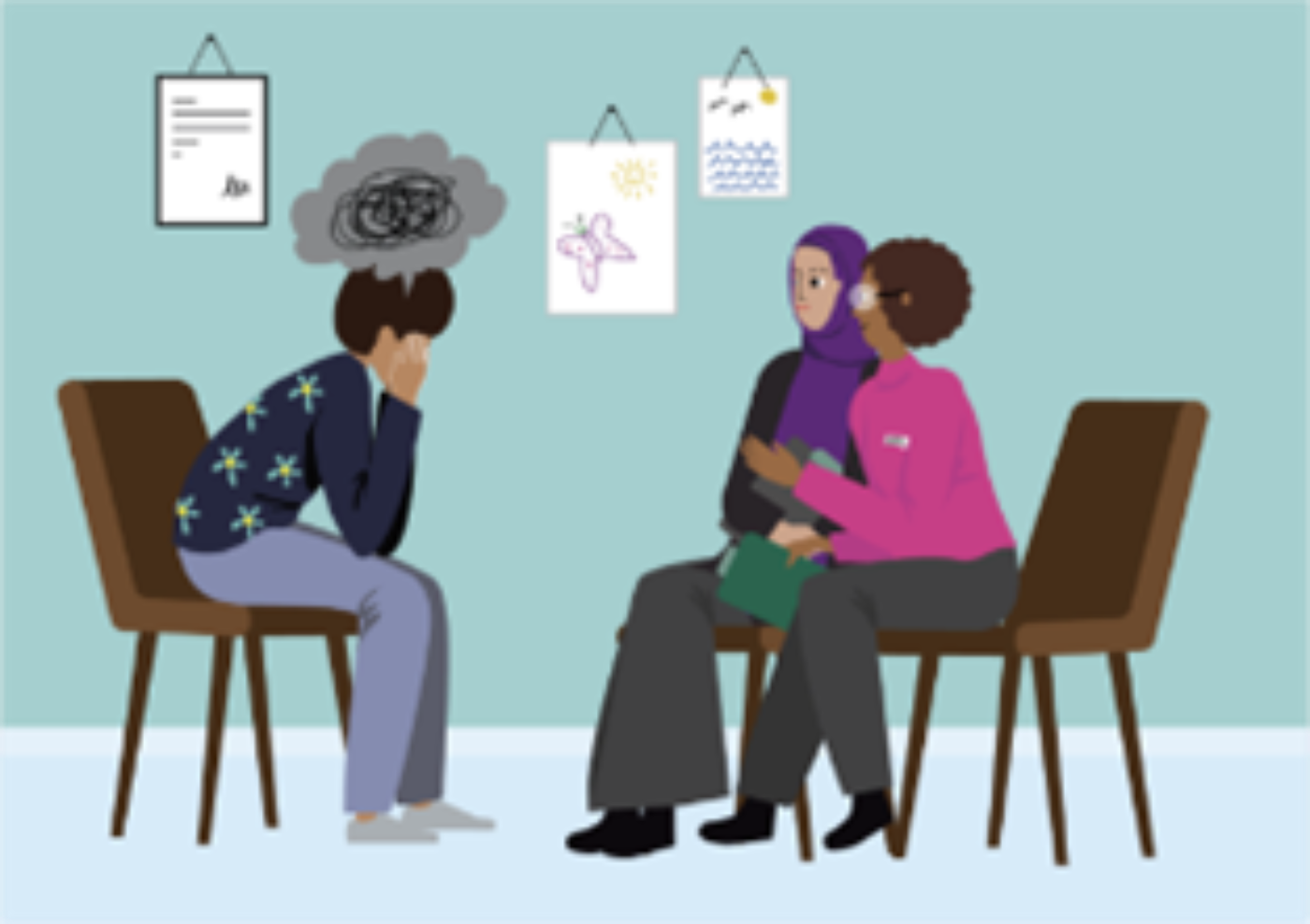 A person who feels worried talking to a psychologist in an office. An interpreter is also present. 